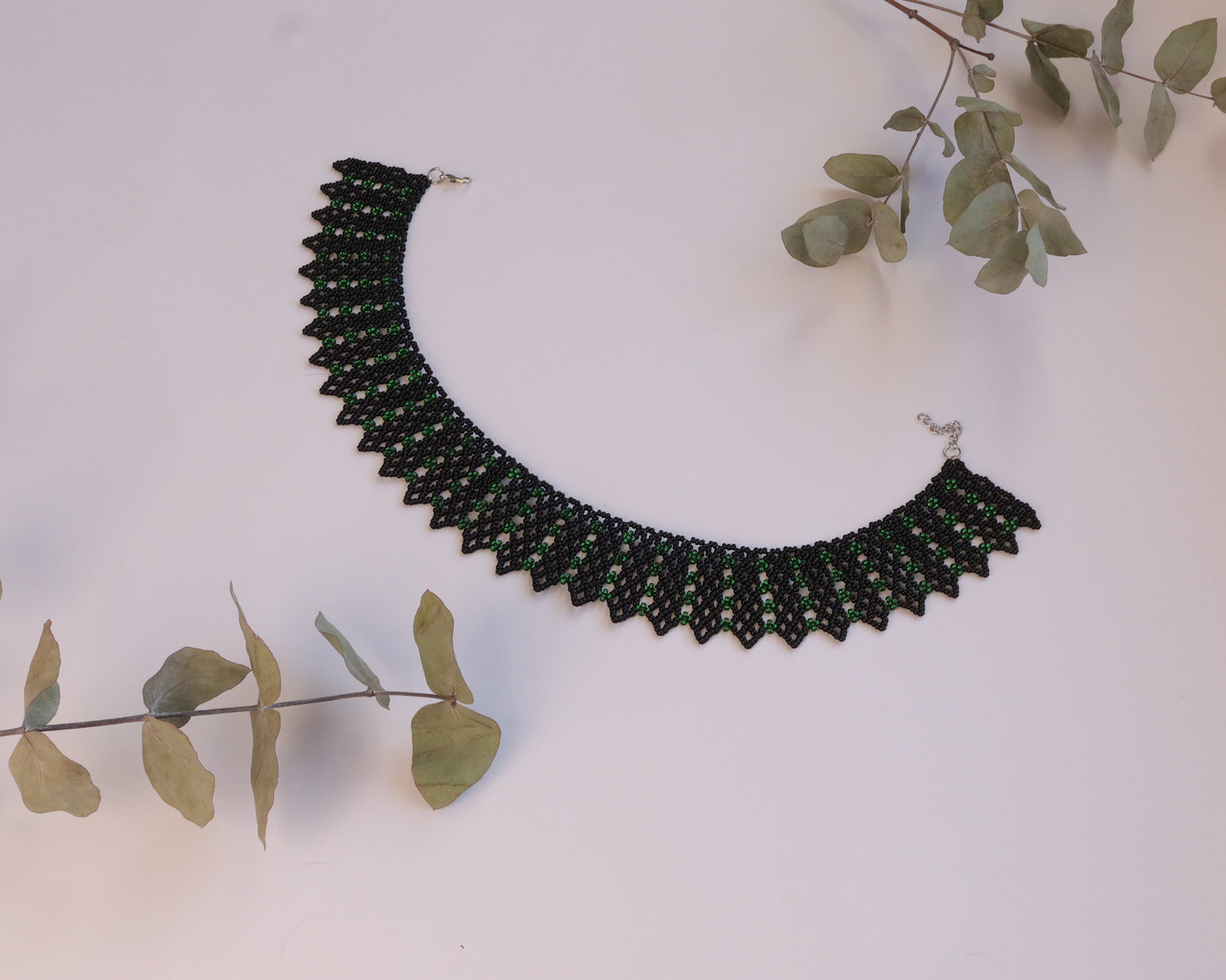 Comely UA Silyanka "Veil" beaded necklace in black with green accents, geometric design, adjustable clasp.