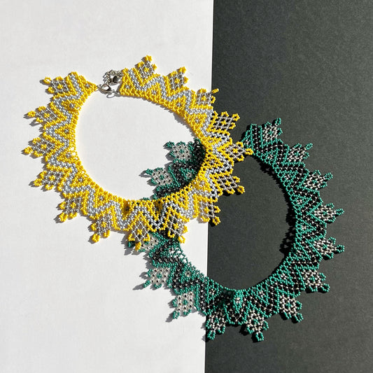 Sun & Forest Harmony yellow and green variants with white accents 