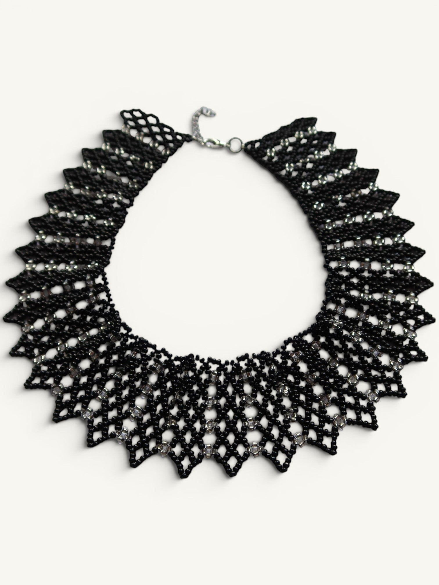 Comely UA black beaded necklace with silver accents, geometric design, adjustable clasp. Traditional Ukrainian style.