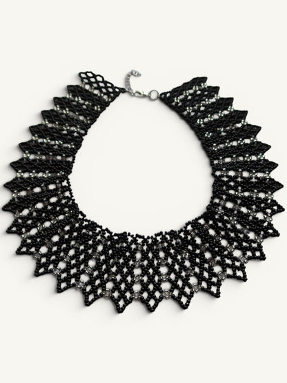 Comely UA black beaded necklace with silver accents, geometric design, adjustable clasp. Traditional Ukrainian style.