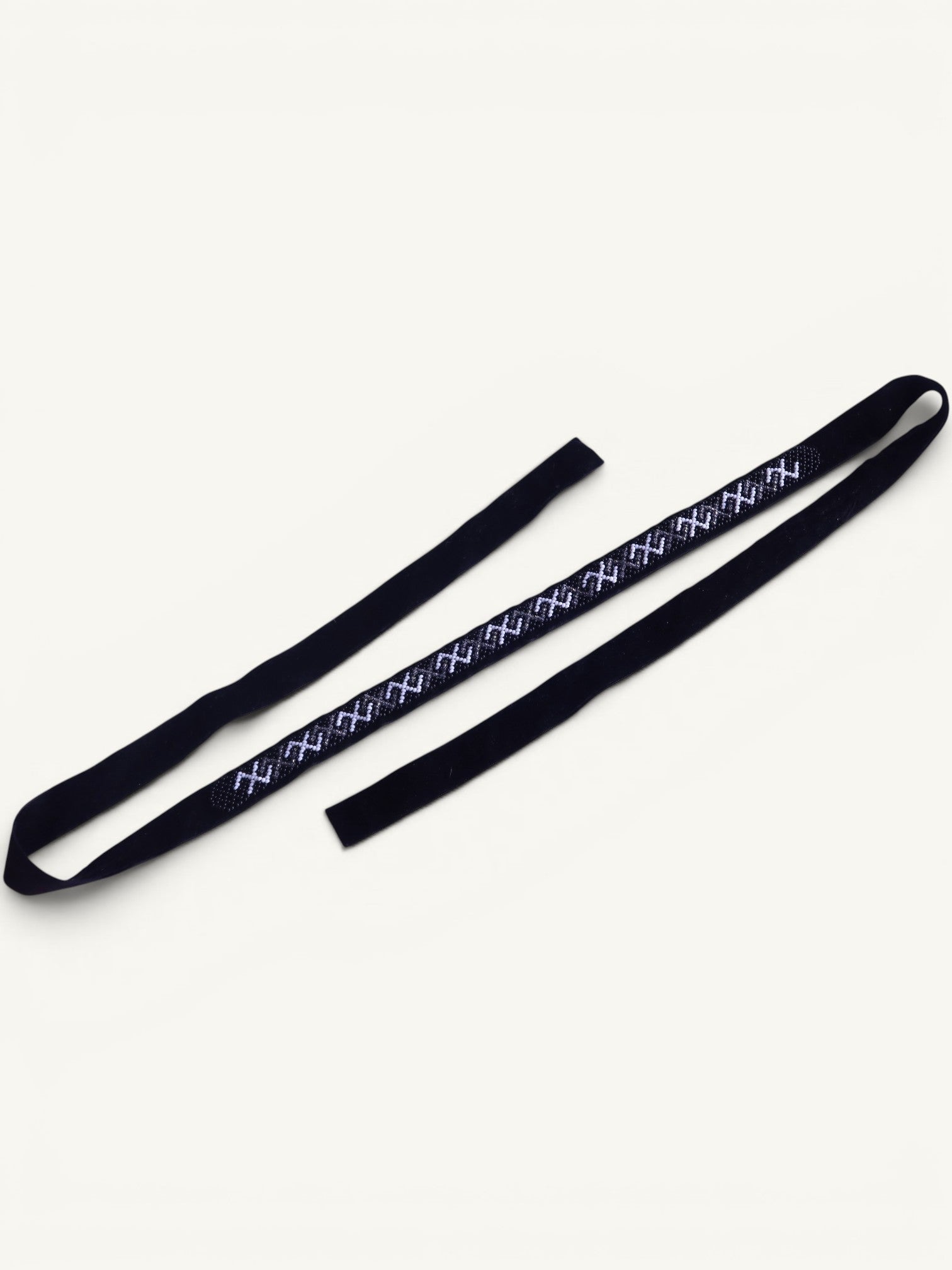 Comely UA Black Path gerdan necklace with geometric diamond and cross pattern in white Czech seed beads and black velvet ties.