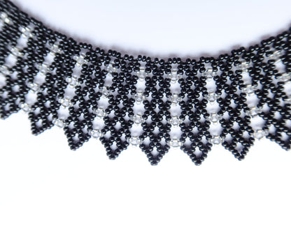Comely UA black and silver beaded necklace with geometric pattern, inspired by Ukrainian design.