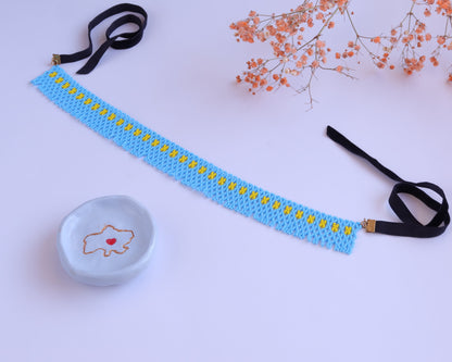 Comely UA light blue beaded choker with yellow star pattern and black velvet ties. Replica of a traditional Pokuttian gerdan.