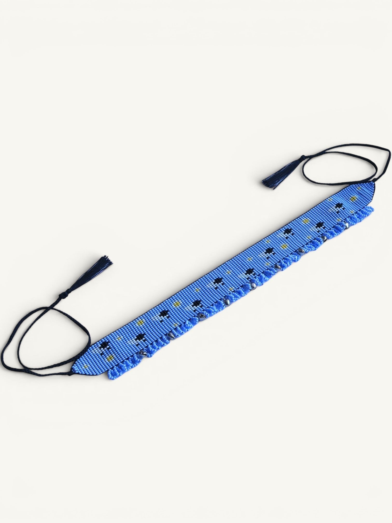 Comely UA blue beaded gerdan with white daisies and sheep pattern, featuring fringe and tassels.