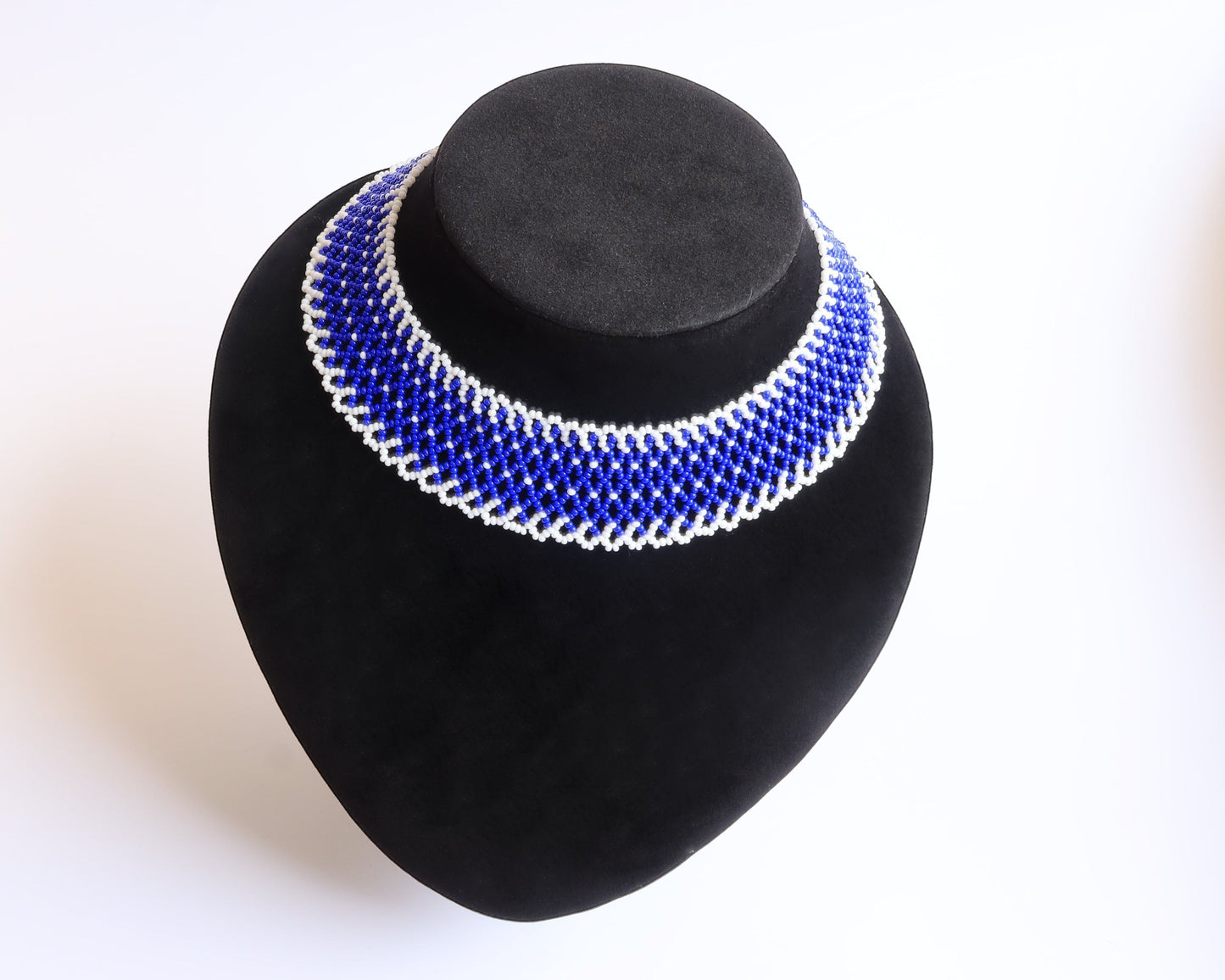 Comely UA blue and white beaded choker necklace with a diamond pattern, made of Czech seed beads and nylon thread.