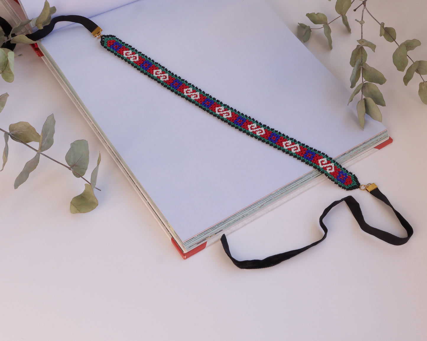Comely UA Gerdan "Neresnytsia" beaded choker with red, blue, green, and white diamond pattern. Adjustable velvet ties.
