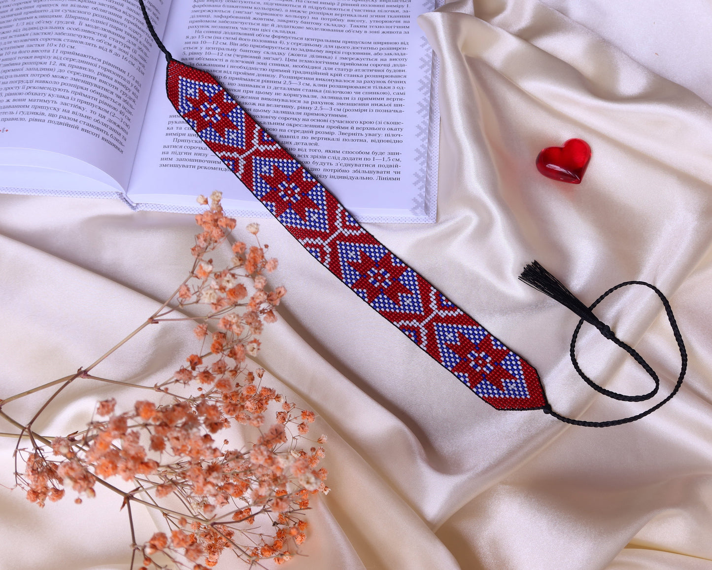 Comely UA Gerdan "Donechchyna" beaded necklace with red, blue, and white geometric pattern. Adjustable ties with tassels.