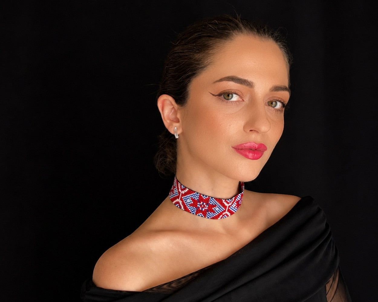 Comely UA Gerdan "Donechchyna" beaded choker necklace with red, white, and blue geometric pattern. Adjustable ties.