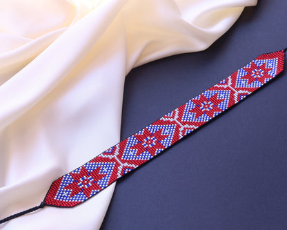 Comely UA Gerdan "Donechchyna" beaded choker with red, blue, and white geometric pattern. Adjustable ties.
