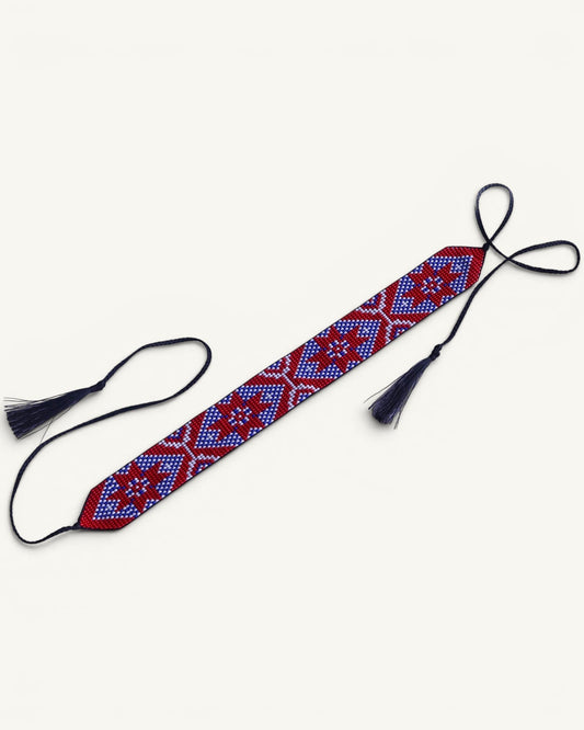 Comely UA Gerdan "Donechchyna" beaded choker with red, blue, and white geometric pattern and black tassels.