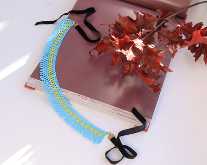 Comely UA Gerdan Hrushka beaded necklace, light blue with yellow seed bead accents, velvet ties.