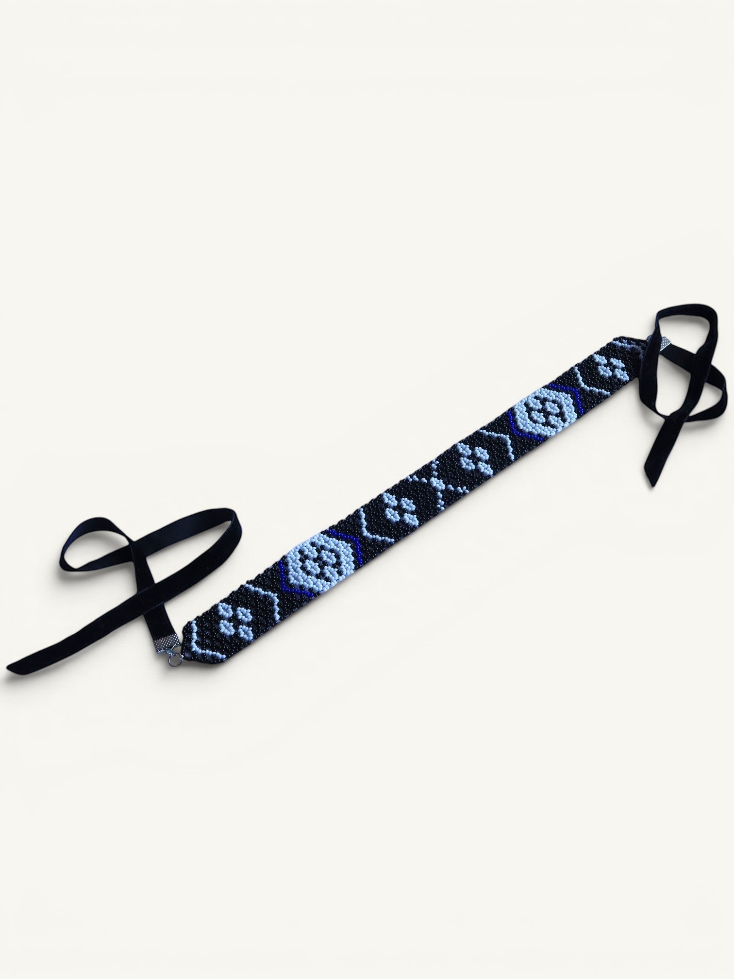 Comely UA black, blue, and white beaded gerdan necklace with traditional Ukrainian pattern and velvet ribbons.
