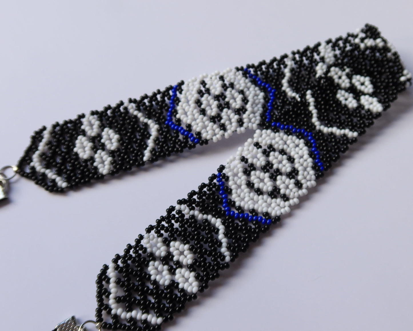 Comely UA Gerdan Kosach beaded necklace, black, white, and blue Czech seed beads, diamond pattern, velvet ribbons.