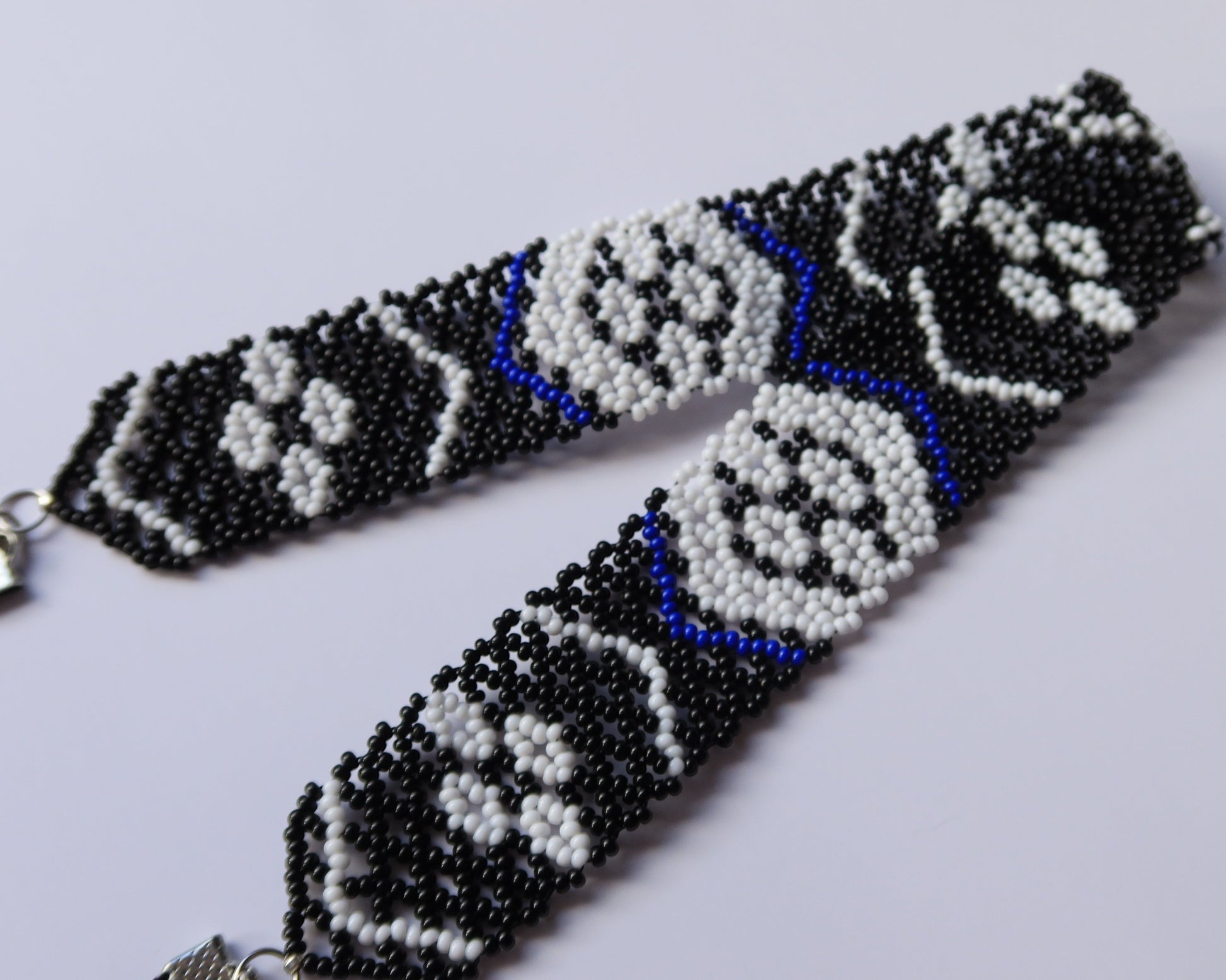 Comely UA Gerdan Kosach beaded necklace, black, white, and blue Czech seed beads, diamond pattern, velvet ribbons.
