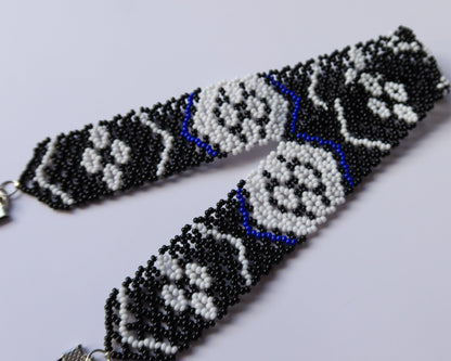 Comely UA Gerdan Kosach beaded necklace, black, white, and blue Czech seed beads, diamond pattern, velvet ribbons.