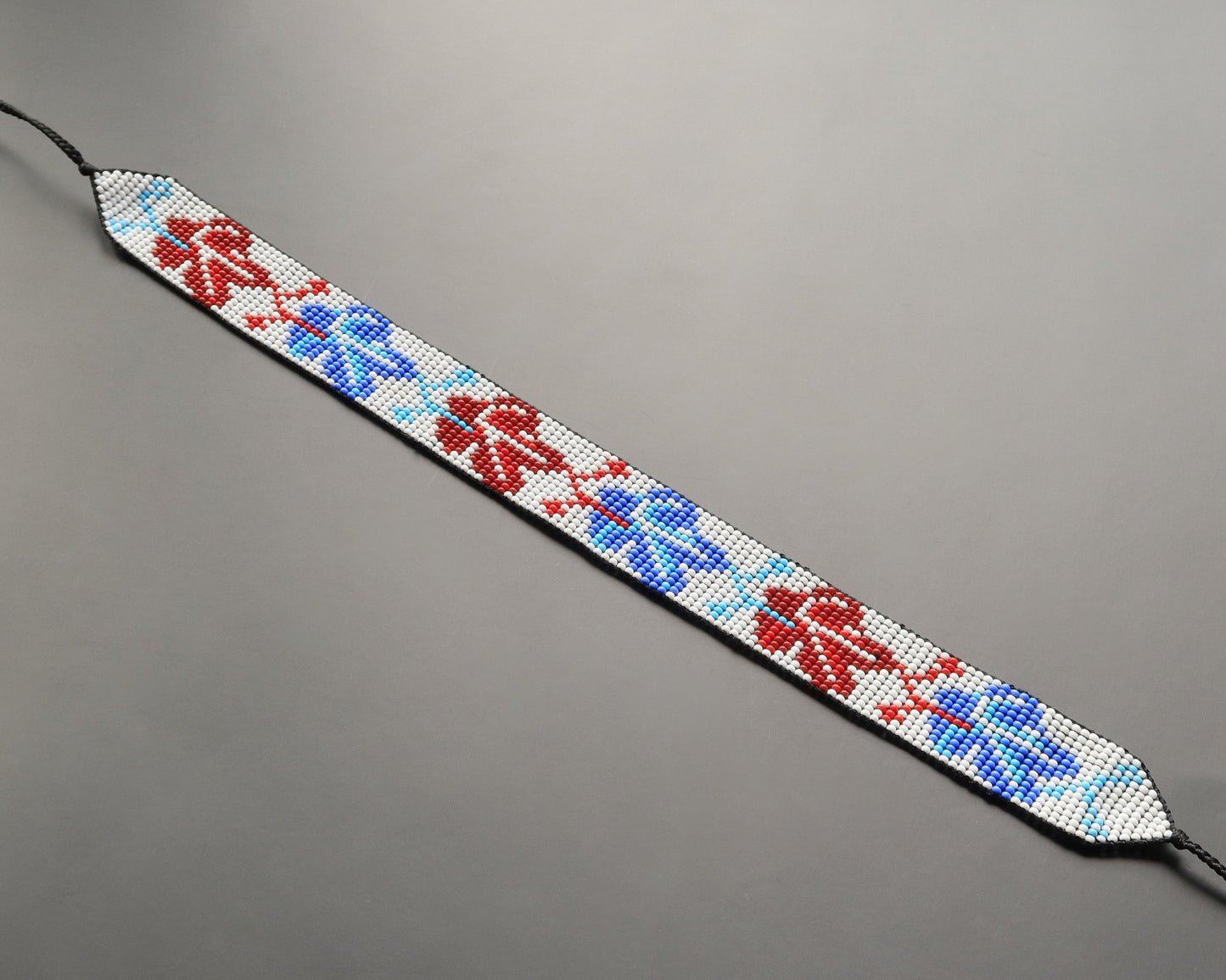 Comely UA beaded gerdan necklace with red, blue, and white leaf pattern. Czech seed beads.