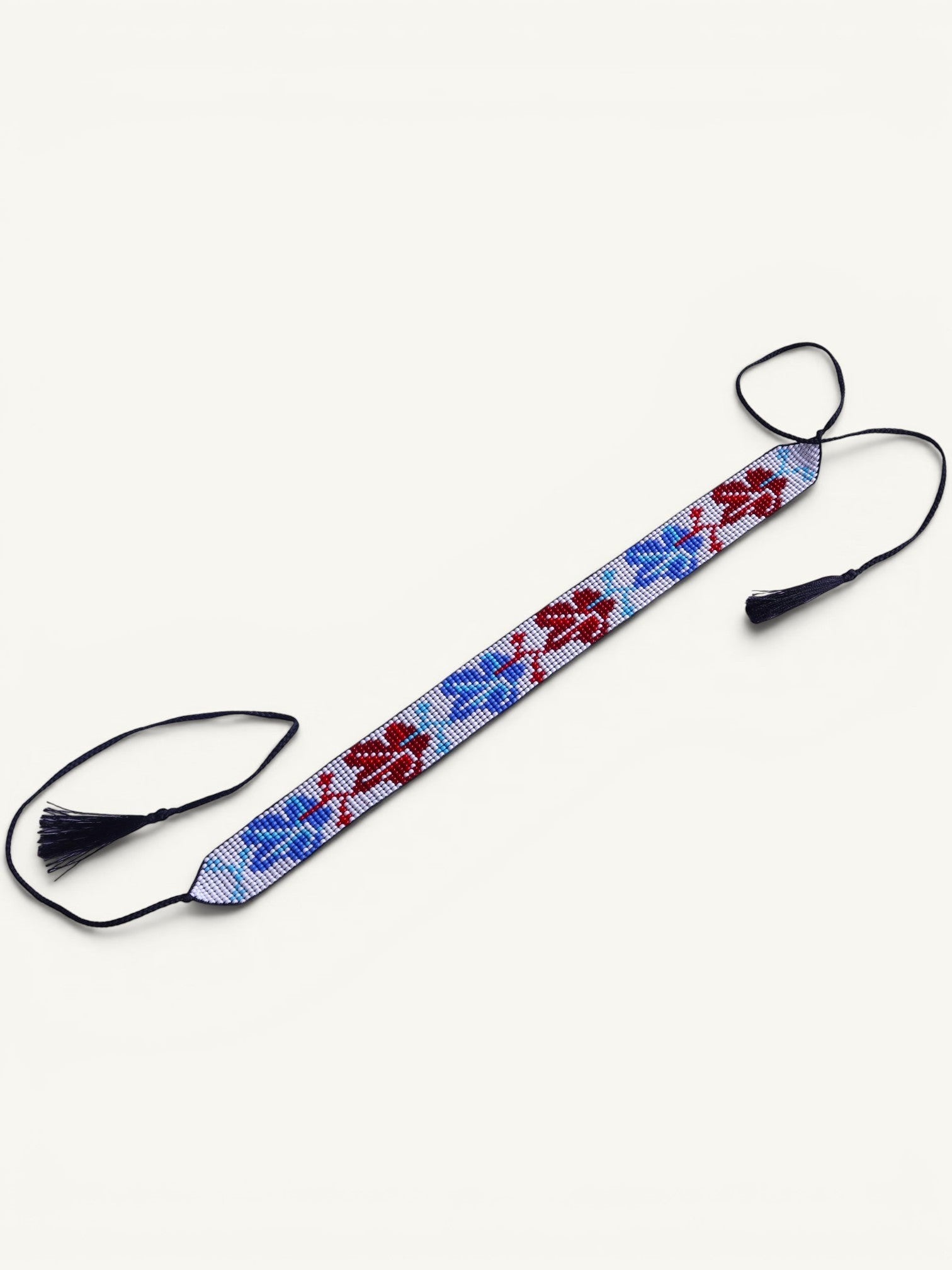 Comely UA beaded gerdan necklace with blue and red leaf pattern, adjustable cords with tassels.