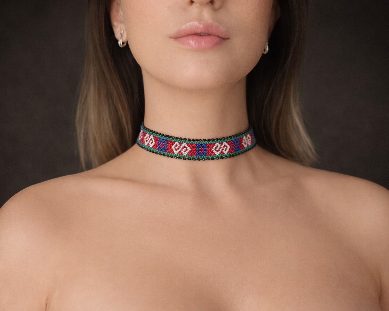 Comely UA Gerdan "Neresnytsia" choker with red, blue, white, and green diamond beadwork pattern. Adjustable velvet ties.