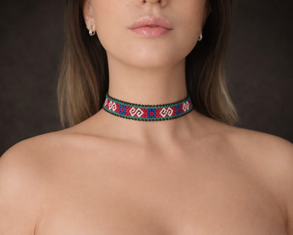 Comely UA Gerdan "Neresnytsia" choker with red, blue, white, and green diamond beadwork pattern. Adjustable velvet ties.