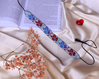 Comely UA beaded gerdan necklace with red and blue leaf pattern, adjustable cords, Czech seed beads.