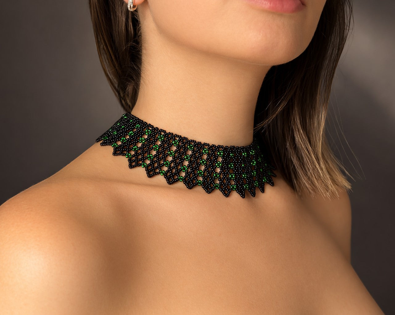 Comely UA black and green beaded choker necklace with geometric pattern, inspired by Ukrainian tradition.