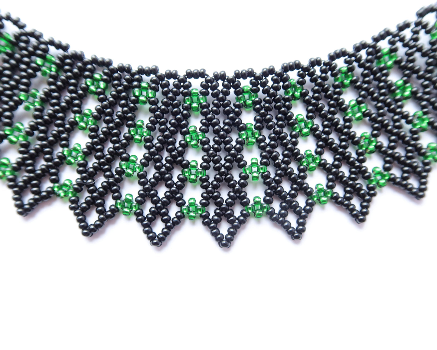 Comely UA green and black beaded necklace with geometric pattern, inspired by traditional Ukrainian design.