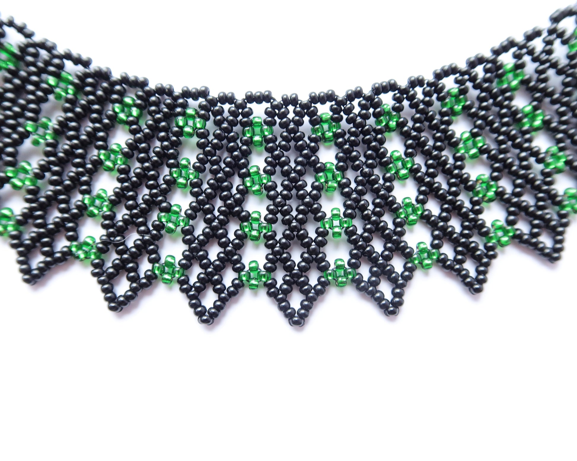 Comely UA green and black beaded necklace with geometric pattern, inspired by traditional Ukrainian design.