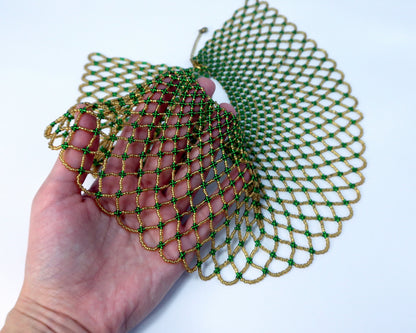 Comely UA Kupava beaded collar in green and gold Czech seed beads, featuring an open net design and adjustable clasp.