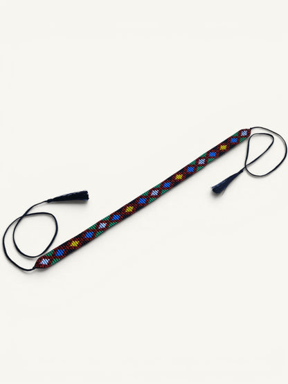 Comely UA Legacy of Time gerdan, a beaded necklace with diamond motifs in red, yellow, blue, green, and white, featuring tassel cords.