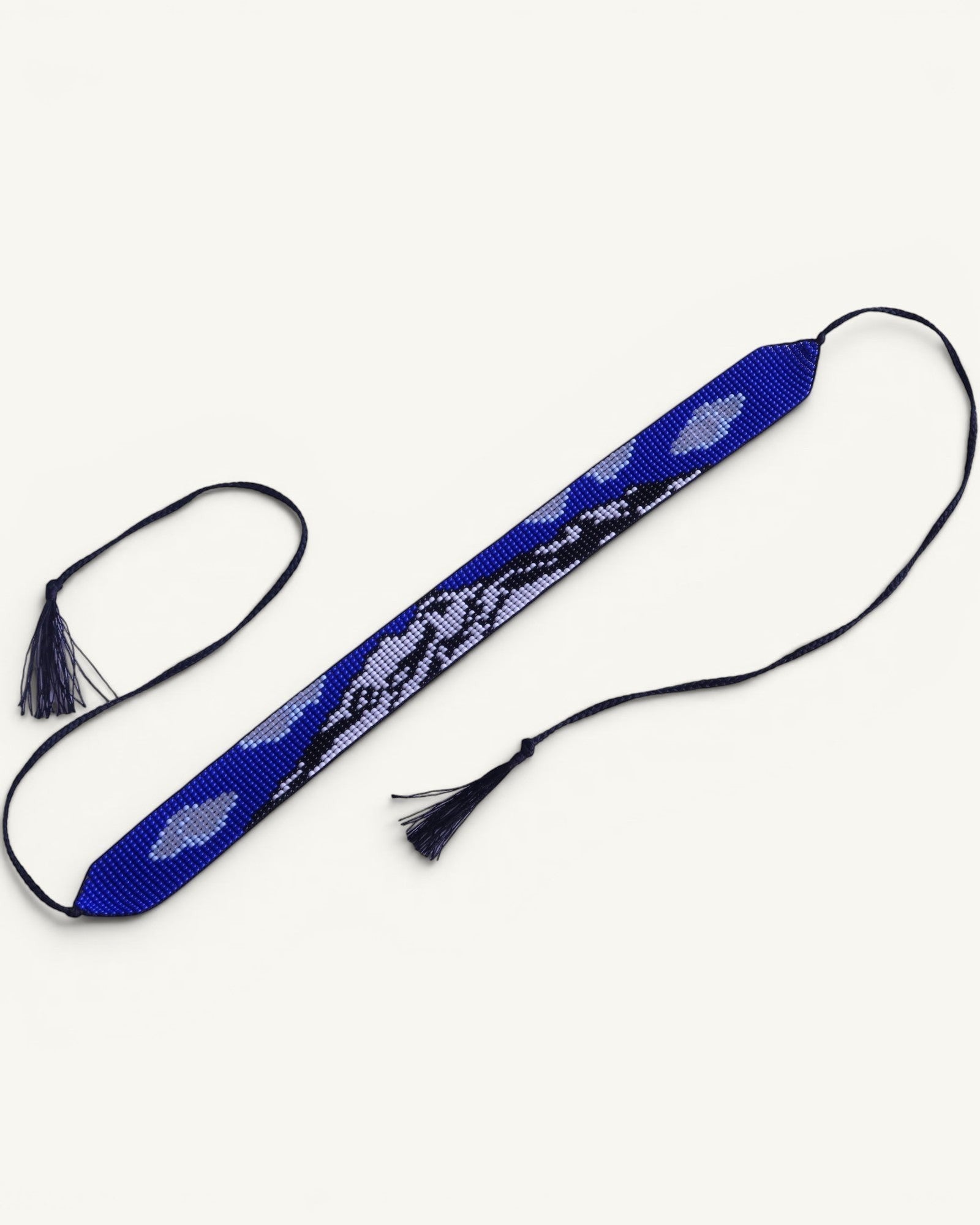 Comely UA beaded gerdan with Mont Blanc mountain and cloud pattern in blue, white, and black. Adjustable ties with tassels.
