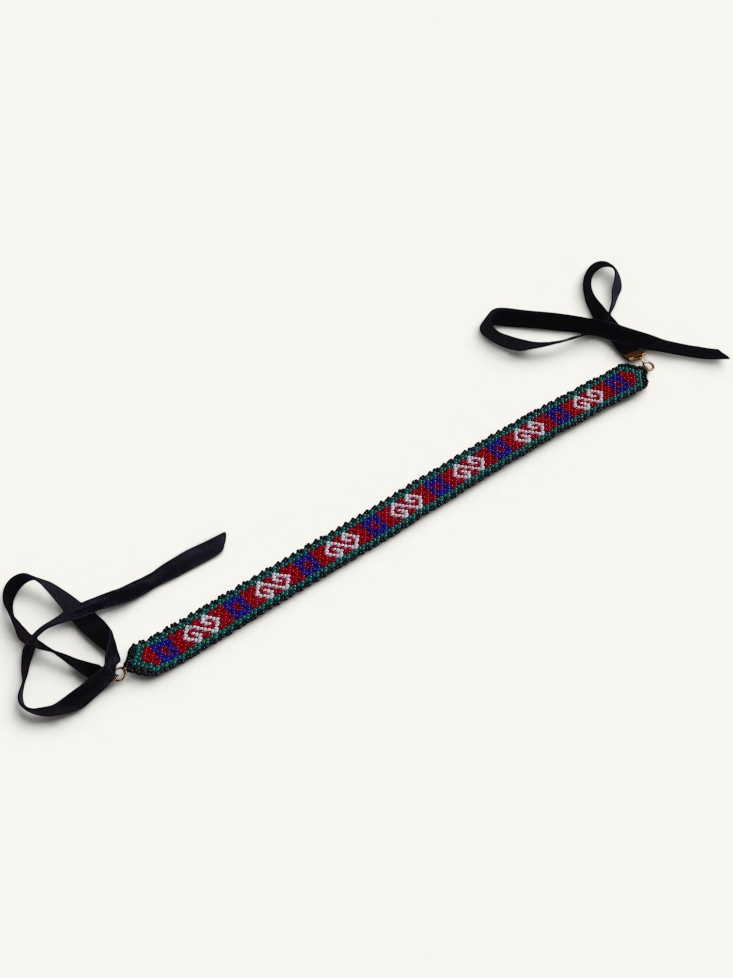Comely UA Neresnytsia gerdan with red, blue, and green diamond beadwork and black velvet ties.