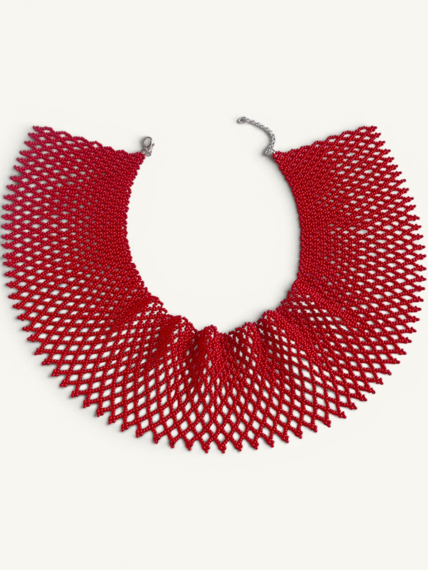 Comely UA red beaded necklace, a traditional Ukrainian silyanka choker with a diamond-shaped net pattern. Features a silver clasp.
