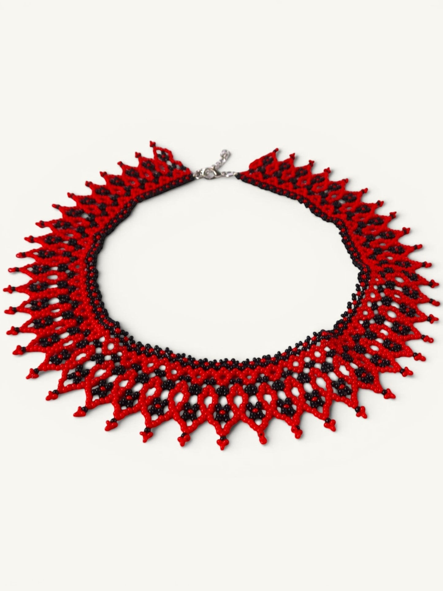 Comely UA red and black beaded silyanka choker necklace with flame-like pattern and adjustable clasp. Czech seed beads.