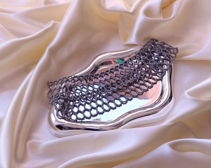Comely UA Silyanka "Bee Nest" choker necklace, silver-gray Czech seed beads, openwork hexagonal pattern, on a silver tray with satin.