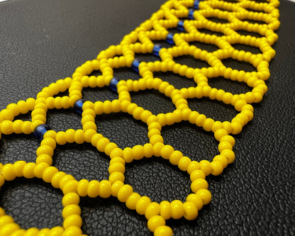 Comely UA Silyanka "Bee Nest" necklace, yellow beaded lace with blue accents, inspired by Ukrainian beadwork.