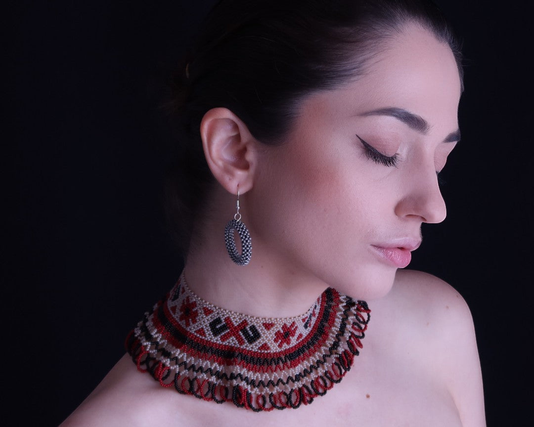 Comely UA Silyanka Heritage of Pokuttia beaded choker necklace with red, black, and cream diamond and cross motifs, paired with matching hoop earrings.