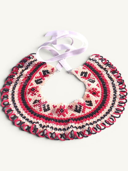 Comely UA Silyanka "Heritage of Pokuttia" beaded collar necklace with red, black, and cream diamond and cross motifs. Features velvet ties.