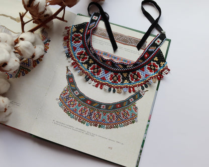 Comely UA two-part Silyanka Ladder beaded necklace replica with red, black, white, blue, yellow, and brown Czech seed beads.