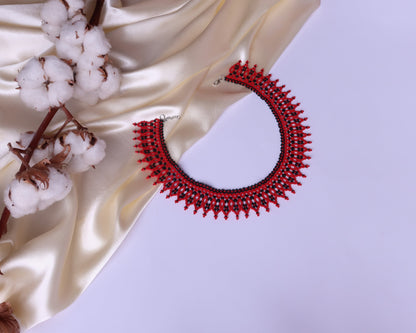 Comely UA Silyanka Leliia red and black beaded choker necklace with flame-like pattern, made of Czech seed beads.