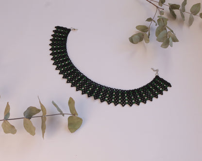 Comely UA Silyanka "Veil" beaded necklace in black with green accents, geometric design, adjustable clasp.