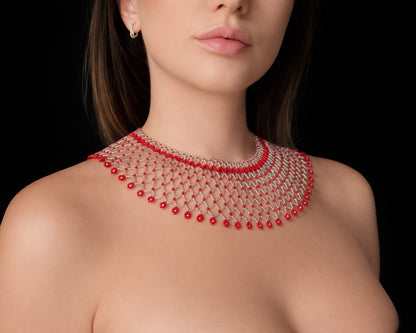 Comely UA Silyanka Solar Crown beaded necklace with red floral accents on a silver web. Czech seed beads.