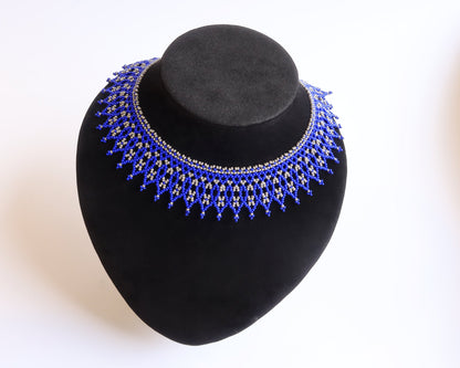 Comely UA Sylianka Leliia blue beaded choker necklace with silver accents, inspired by Ukrainian heritage.