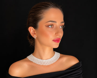 Comely UA white beaded choker necklace, a modern take on traditional Ukrainian silyanka, crafted with intricate beadwork.