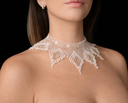 Comely UA white and silver beaded lace choker necklace with diamond and floral motifs. Adjustable velvet ribbon ties.