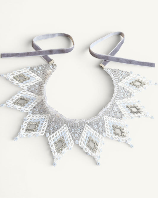 Comely UA white and silver beaded lace collar necklace with diamond motifs and velvet ties.
