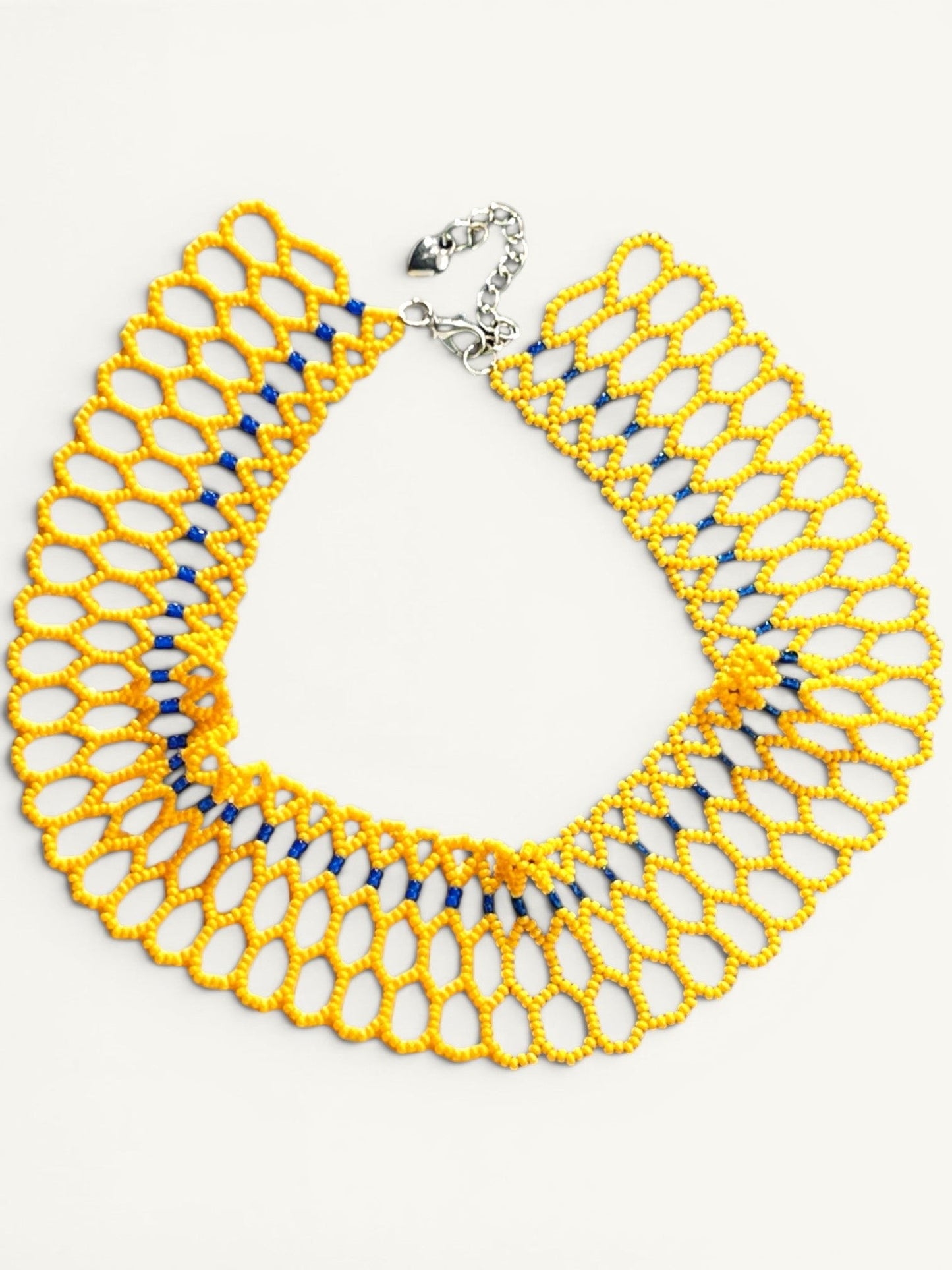 Comely UA yellow and blue beaded lace choker necklace, inspired by Ukrainian beadwork. Features a honeycomb pattern and adjustable clasp.