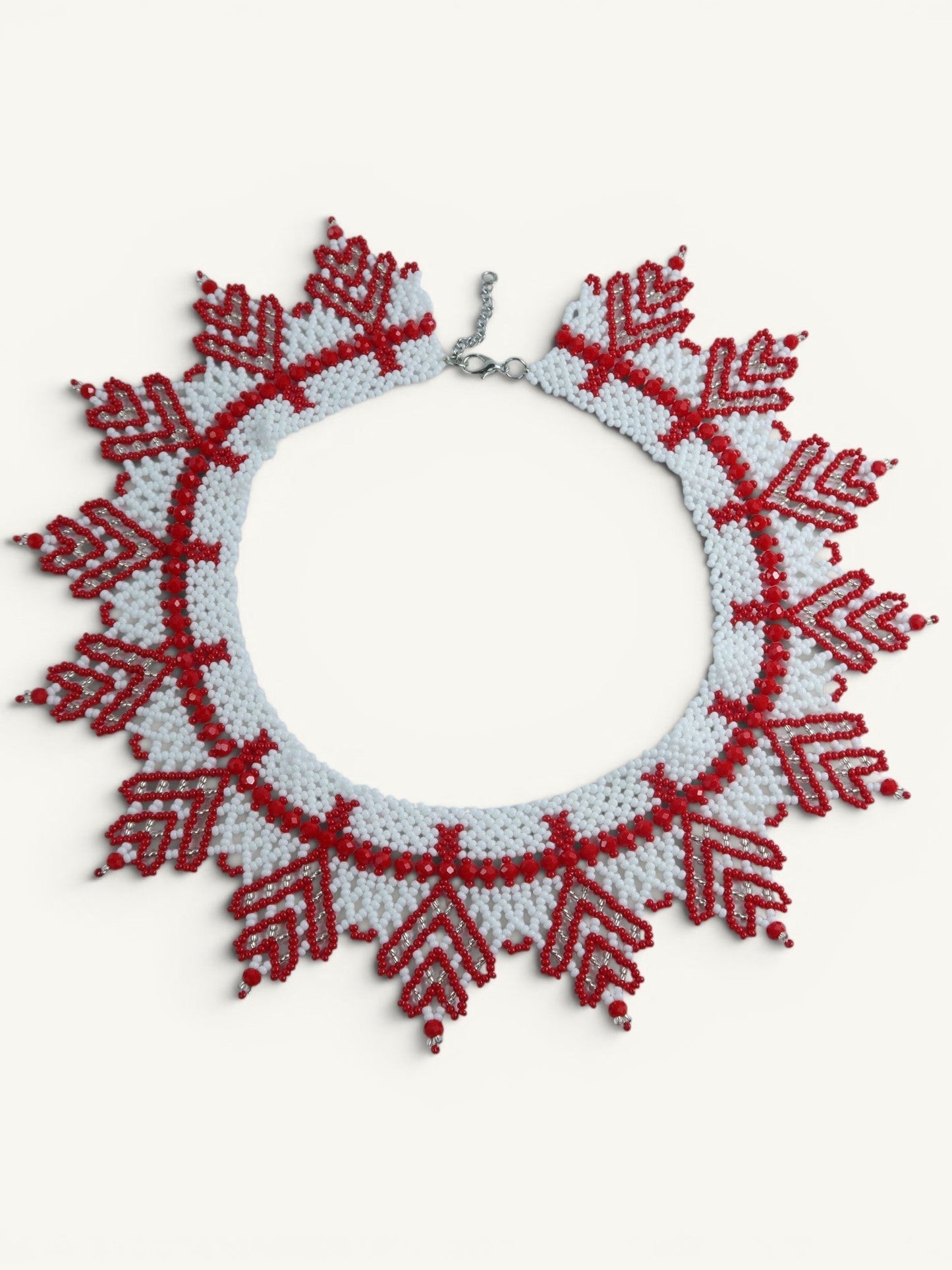Comely UA "Zakhrava" beaded necklace in white and red with jagged sunray design. Czech seed beads.